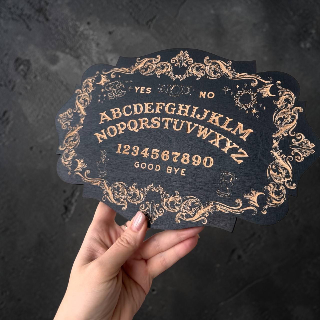 Ouija board, black wood, spirit board with planchette, gothic divination decor