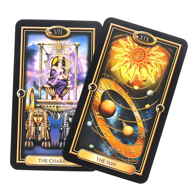two tarot cards, one with a solar design and the other with a chariot design, both featuring the sun as a central element.