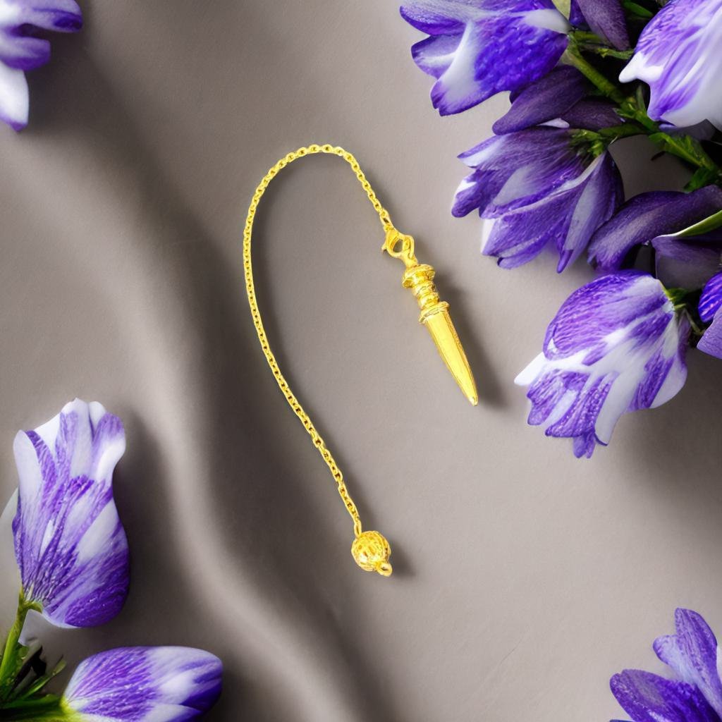 a gold pendulum with a small ball at the end, surrounded by purple flowers on a gray background.