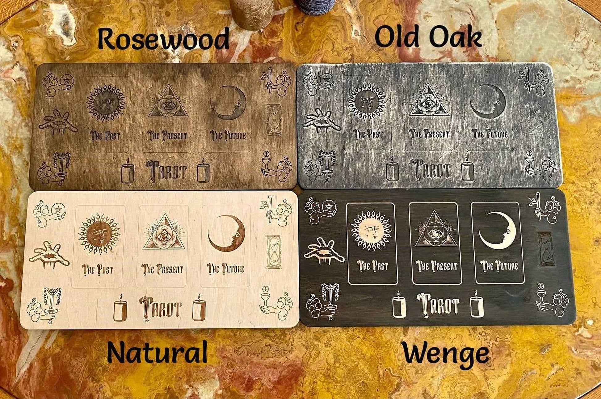 four tarot cards with different color backgrounds, each representing a different tarot card.