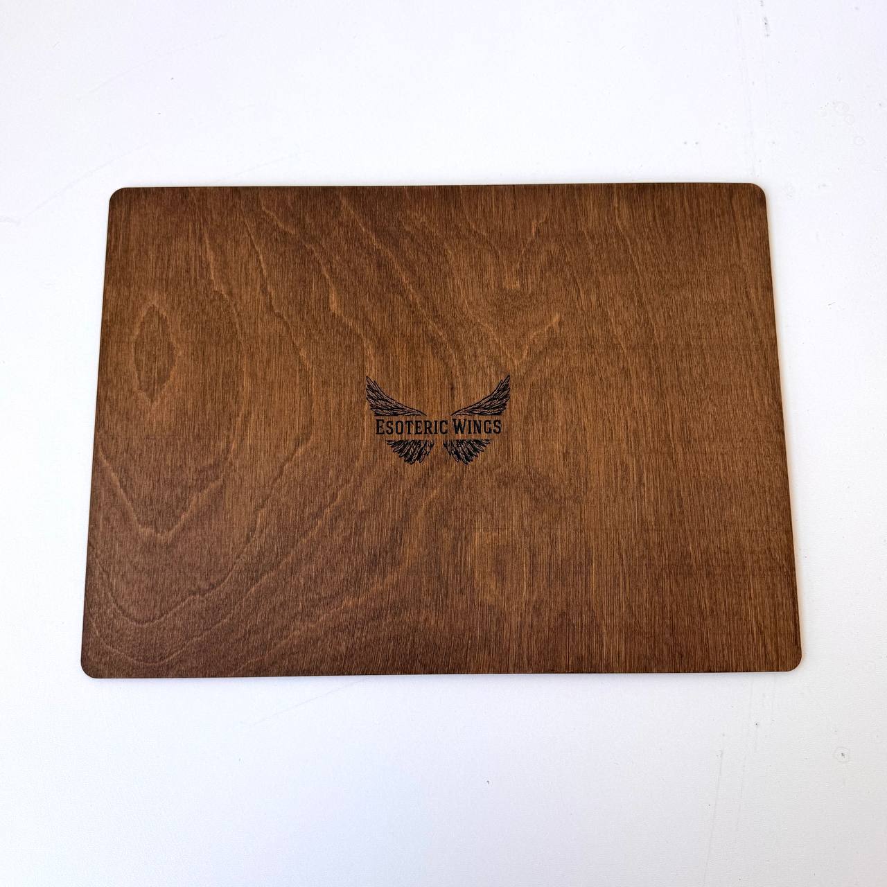 The image is a wooden surface with a logo printed on it.