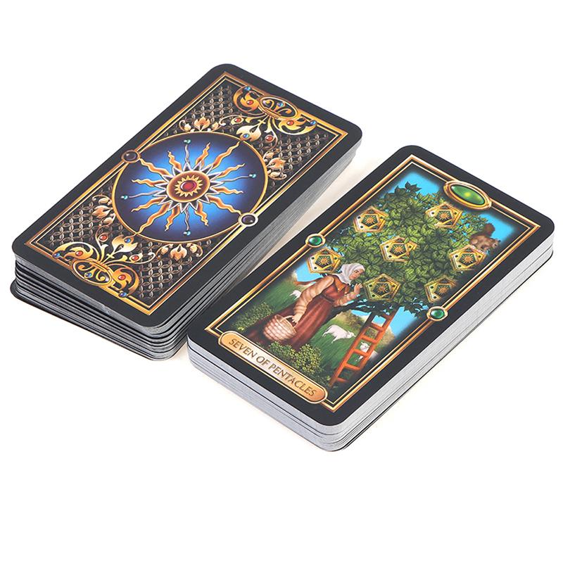 Two tarot cards are shown, one with a sun design and the other with a tree and a figure.