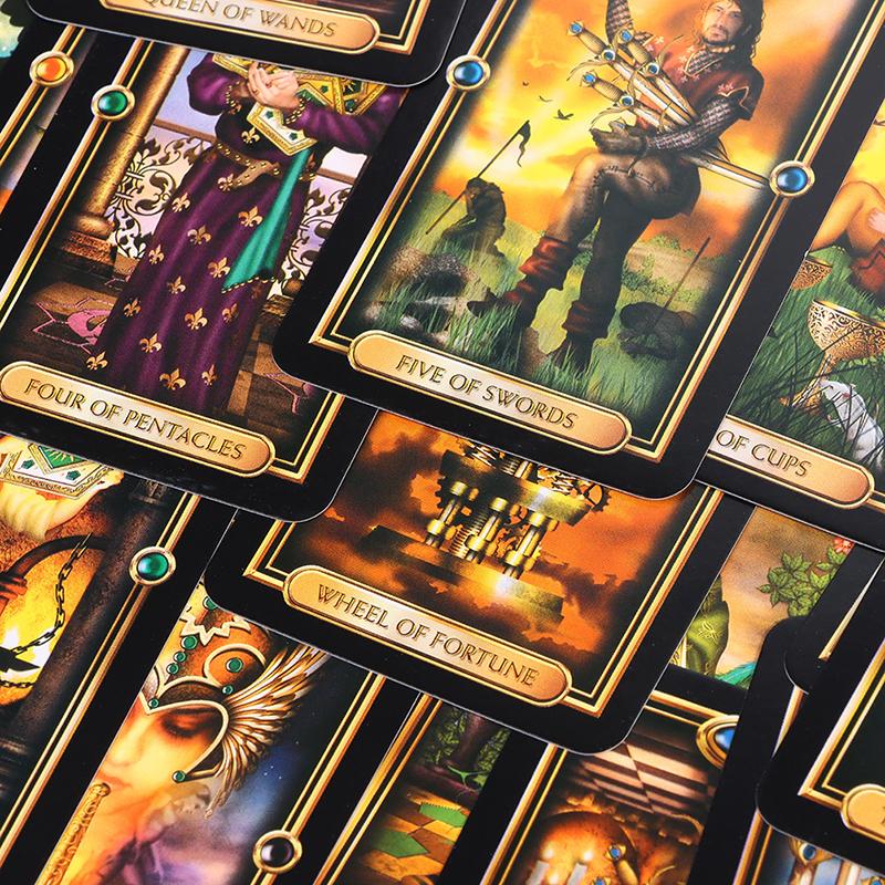 a collection of tarot cards with various designs and titles, including "FOUR OF PENTACLES", "FIVE OF SWORDS", and "WHEEL OF FORTUNE".