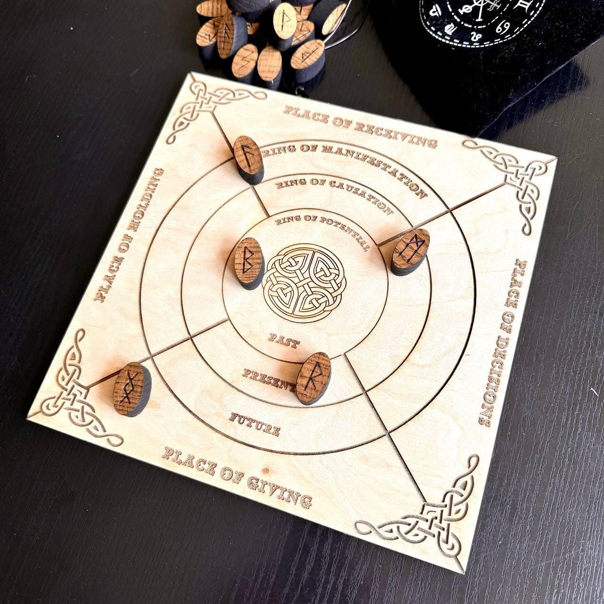 a wooden board game with a circular design and wooden pieces, placed on a dark surface.