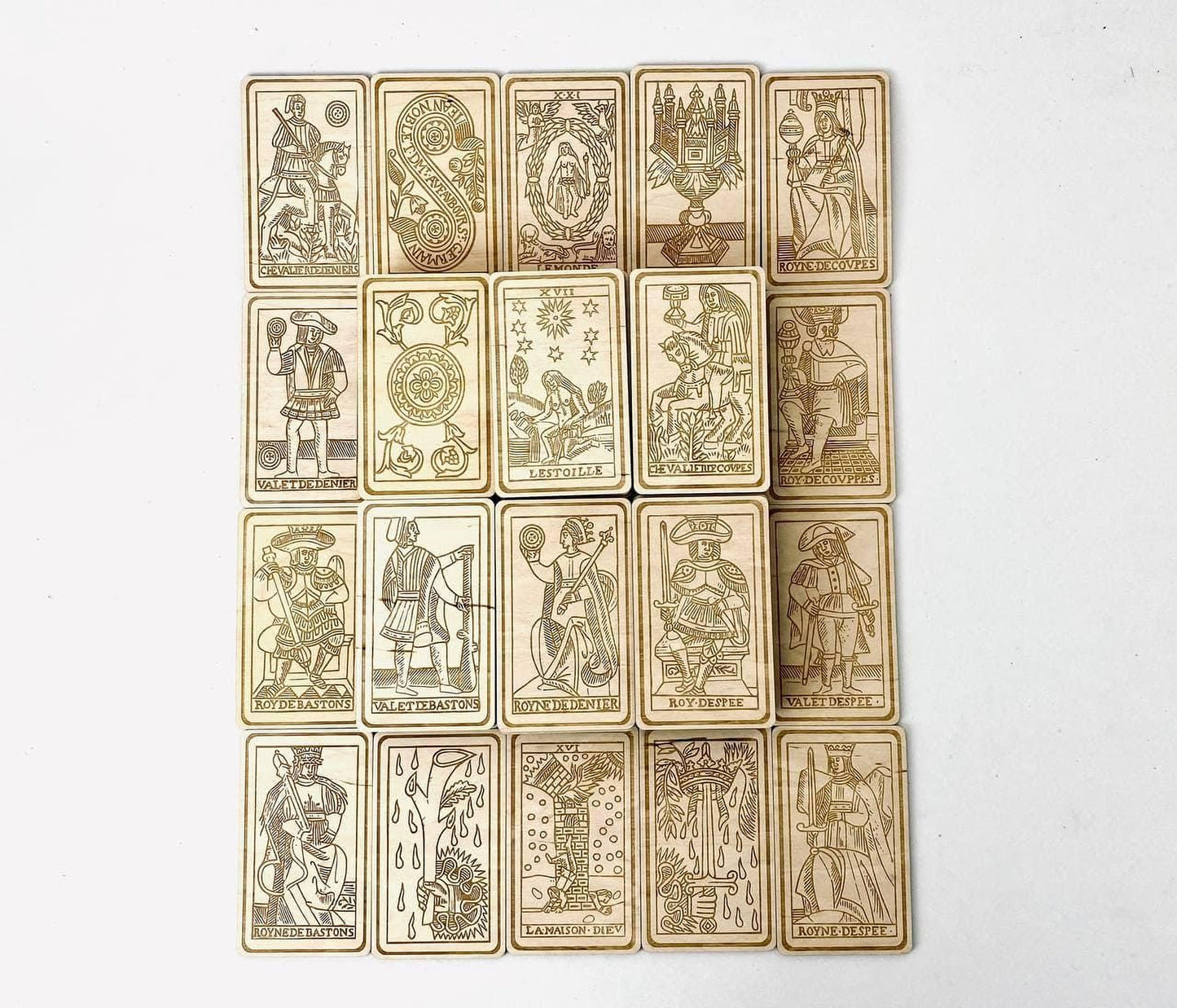 a collection of 16 tarot cards arranged in a grid-like pattern.
