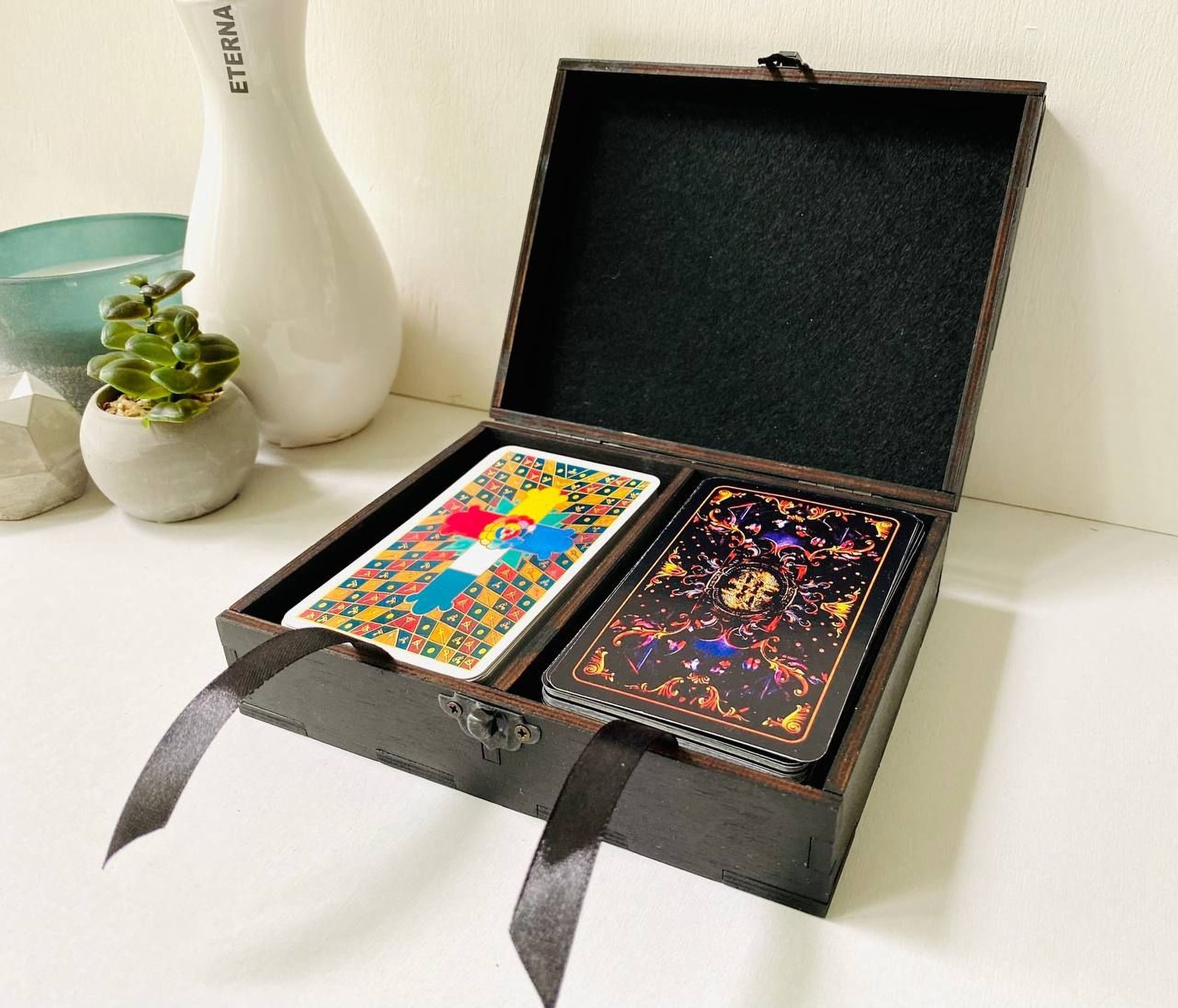Open wooden tarot card box with two compartments for deck storage