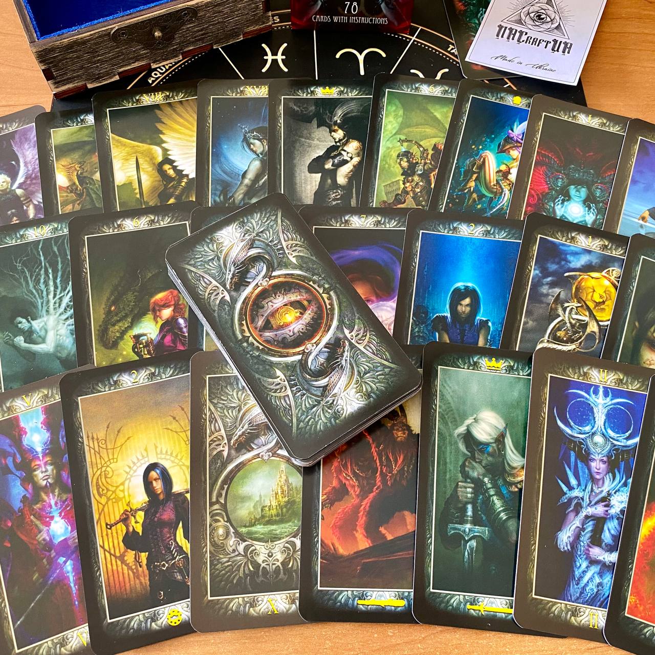 a collection of fantasy-themed tarot cards, each featuring unique illustrations and designs. The cards are arranged in a way that showcases their artistic qualities and the imaginative stories they might tell.